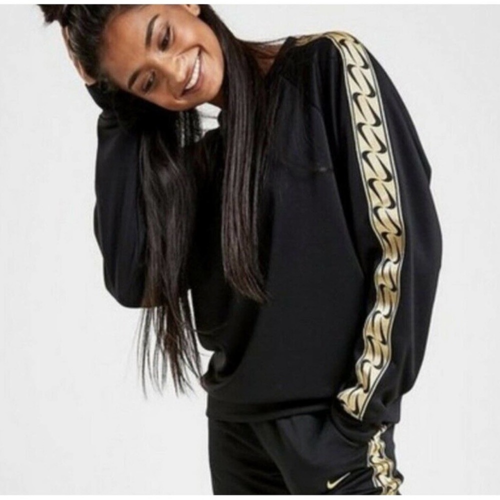 Nike Women Black Top With Gold Swoosh Arm Detail. Size L. P10/A